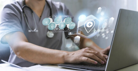 medical-banner-with-doctor-working-laptop